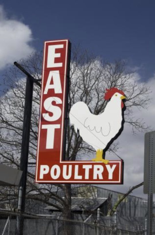 East Poultry's iconic rooster sign on E. 6th Street